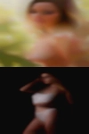 Nude woman jumping